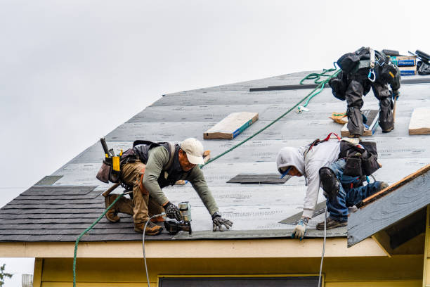 Professional Gutter Installation technician working in Marathon, FL